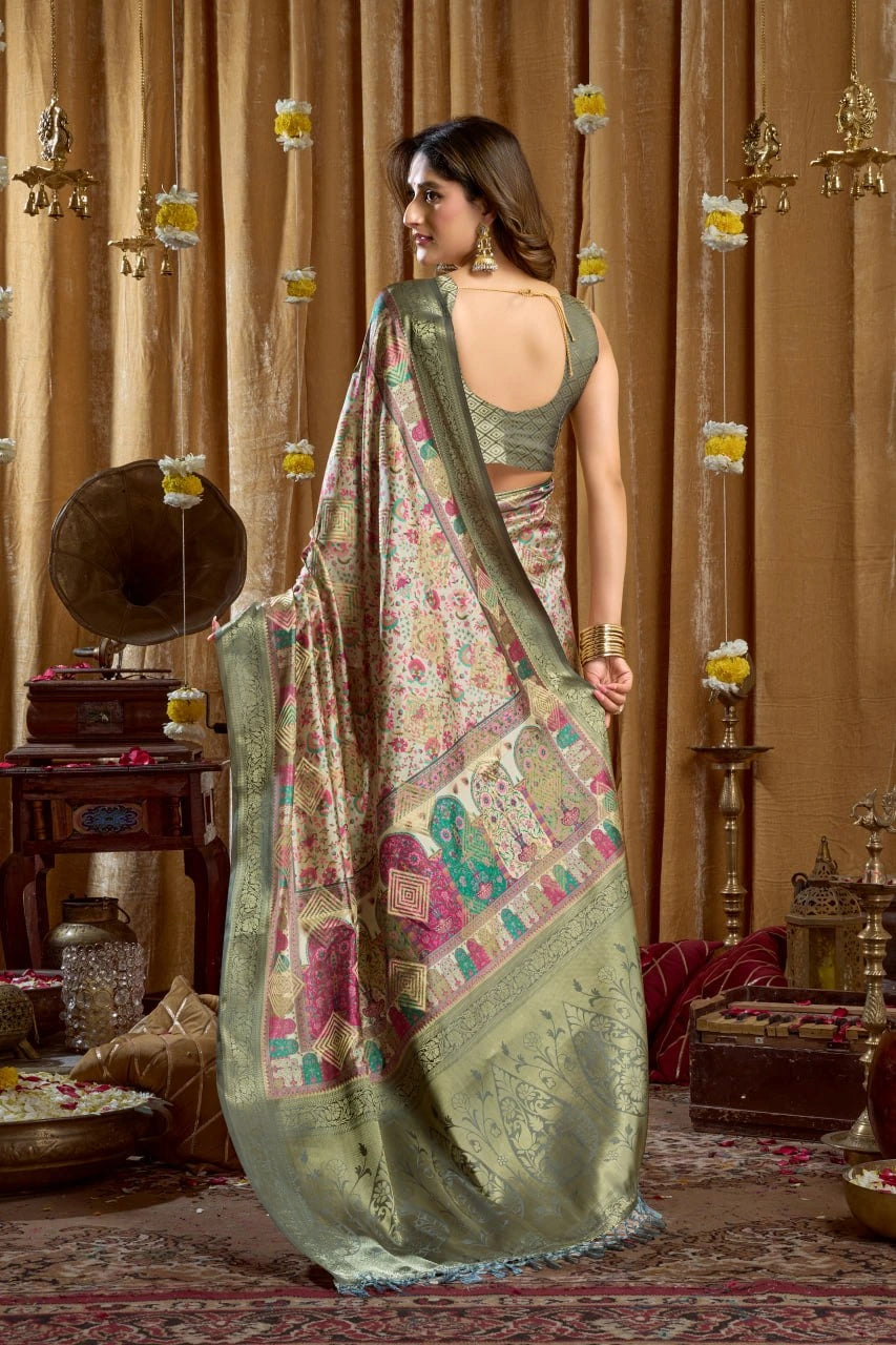 Woman in a traditional saree standing in a decorated room with ornate furniture and decor.